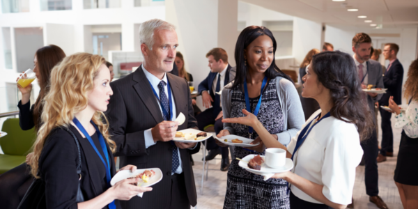 Chamber of commerce members networking at an event